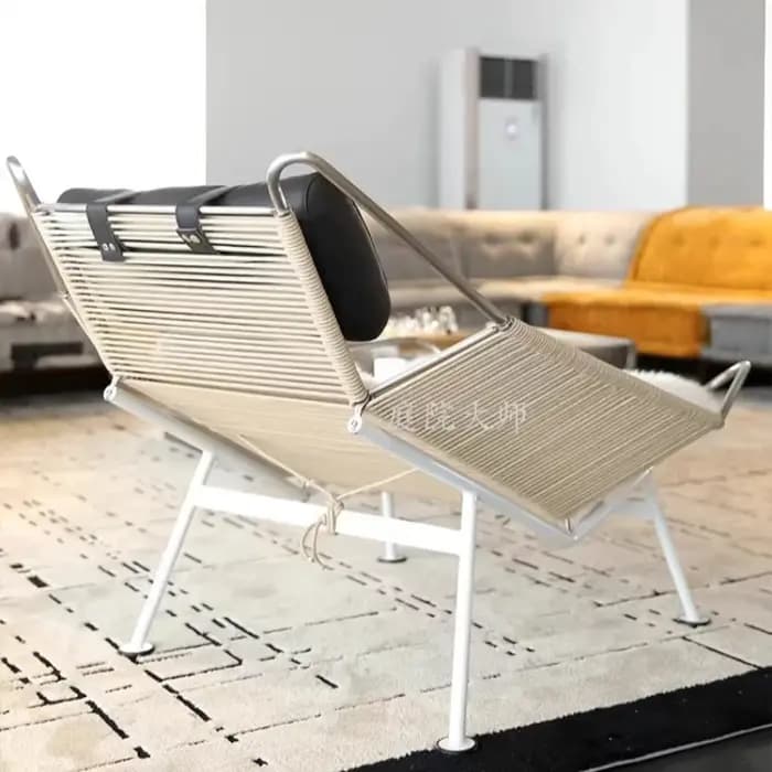 Fauteuil de salon design nordique en laine tricotée