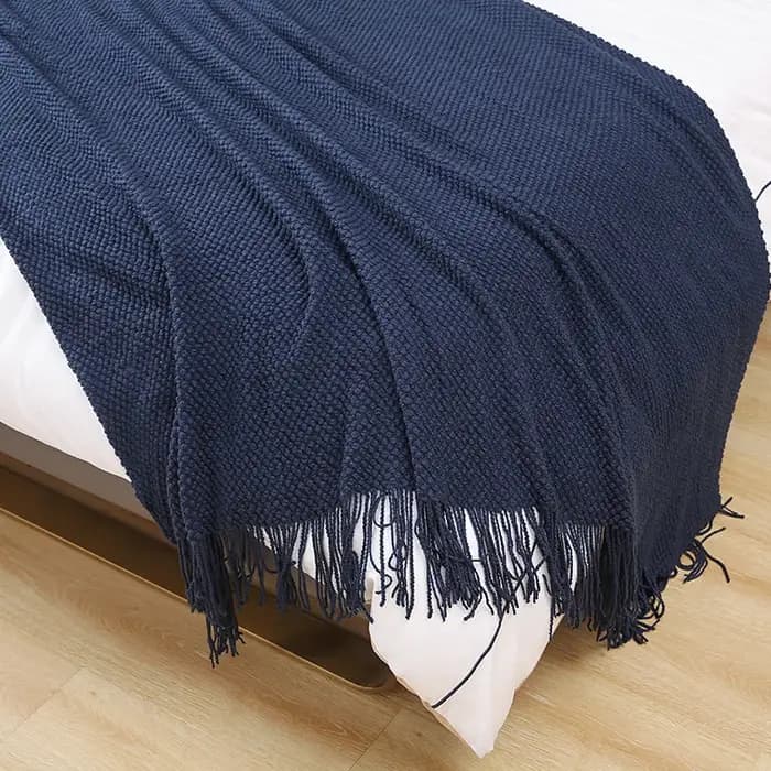 Couverture de canapé douce avec glands