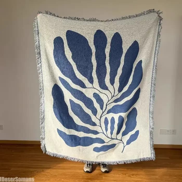Couverture de canapé décontractée bleue avec glands