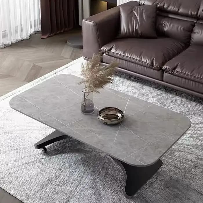 Table basse relevable et table à manger à double usage, multifonctionnelle, pour petit appartement, avec plateau en pierre intégré.