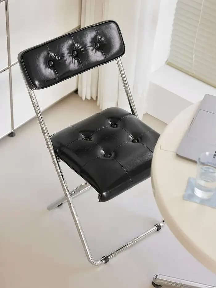 Chaise pliante nordique en cuir huilé et métal