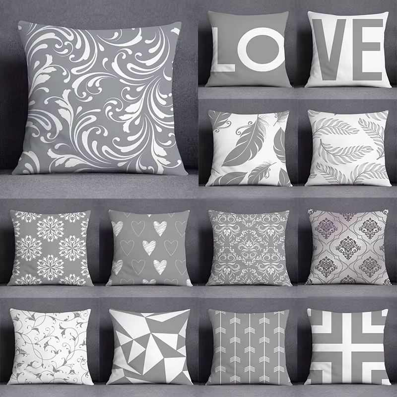 Housse de coussin géométrique gris et blanc
